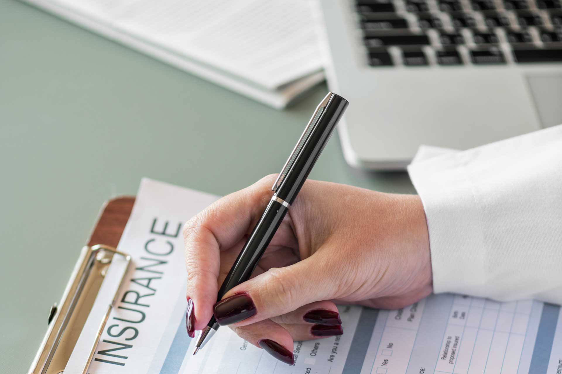 photo of a person checking insurance documents